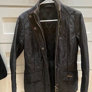 Black quilted Barbour jacket